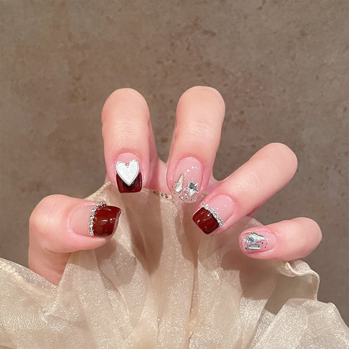 Künstlerisches Press-On Nagelkunst Set mit Herz- und Sterndesigns