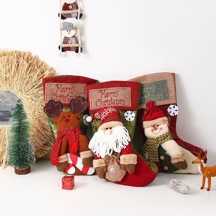 Festlicher Weihnachtsstrumpf mit liebevollen Santa-Motiven Karnz