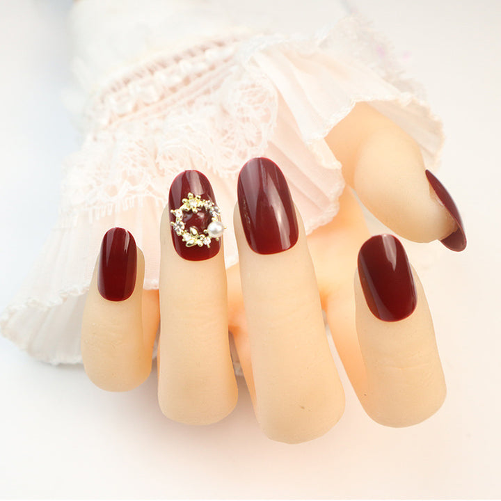 Glänzendes rotes Press-On-Nagelset mit eleganten Perlenakzenten Karnz