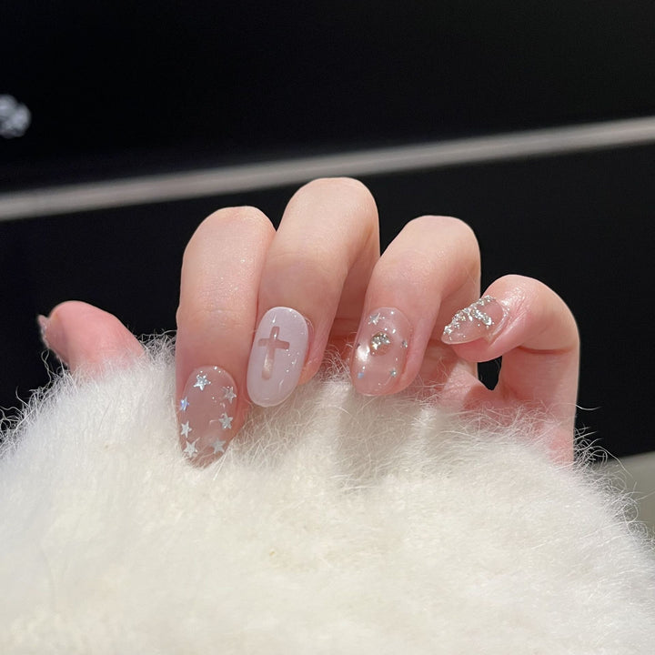 Dekoratives Press-On Nagelkunstset mit Stern- und Kreuzdesigns Karnz