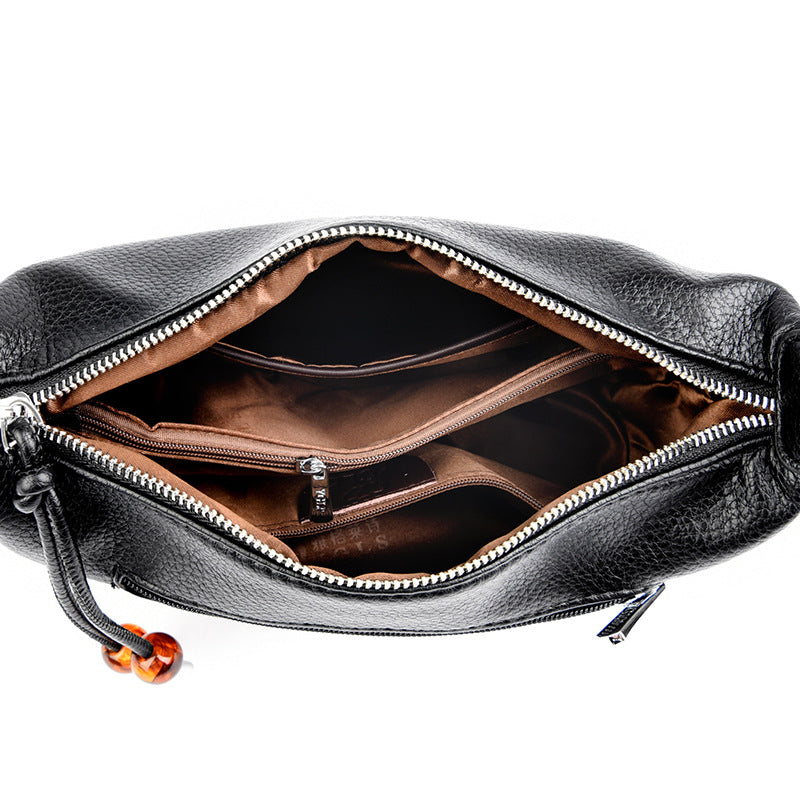Lässige strukturierte Leder-Slingtasche Karnz