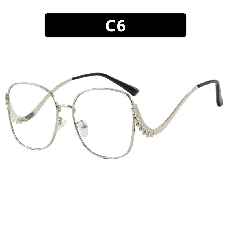 Damen auffällige Sonnenbrille mit funkelnden Applikationen Karnz