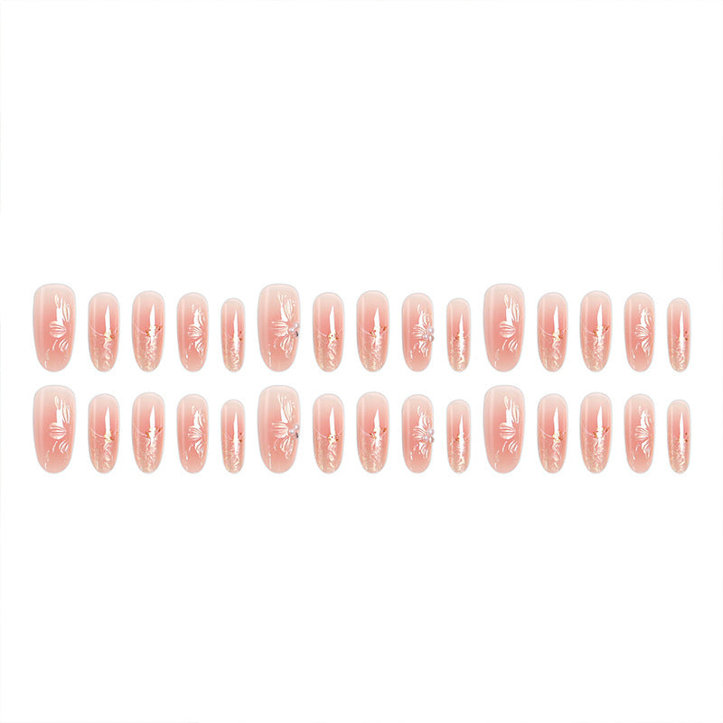 Kunstnagelset mit filigranen Blumen- und Glitzerelementen Karnz