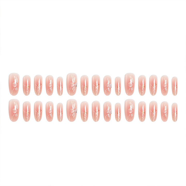 Kunstnagelset mit filigranen Blumen- und Glitzerelementen Karnz
