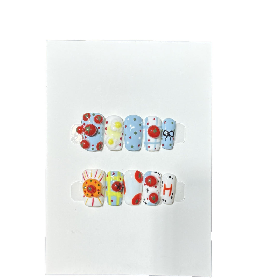 Künstlerisches Press-On-Nagelset mit verspielten floralen und gepunkteten Designs Karnz