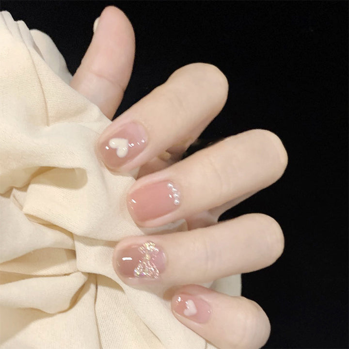 Kunstvolle Nagelverlängerungen mit elegantem Blattmuster Karnz
