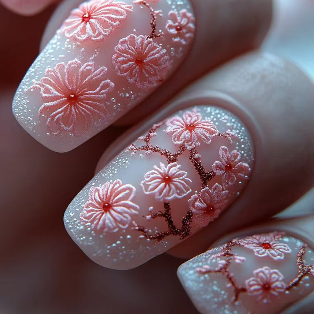 Blumenverzierte Press-On Nagelkunst Karnz