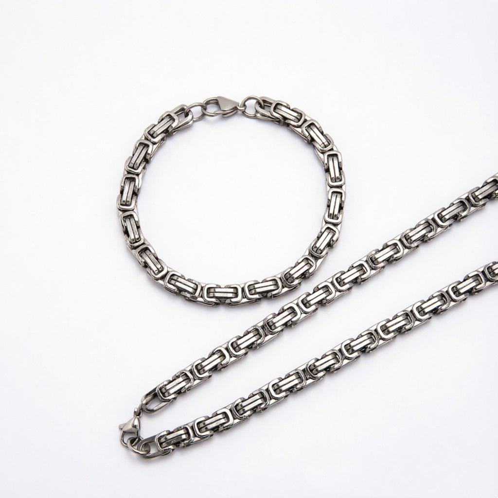 Elegantes ineinandergreifendes Kettenhalsketten- und Armbandset Karnz