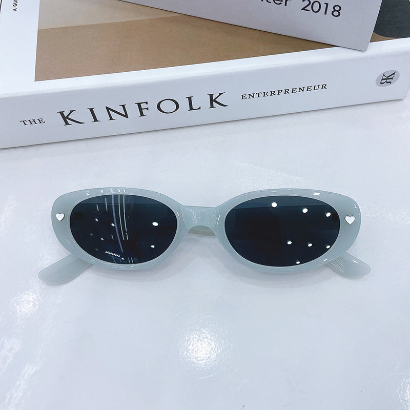 Modische Cat-Eye Sonnenbrille mit Herzen Karnz