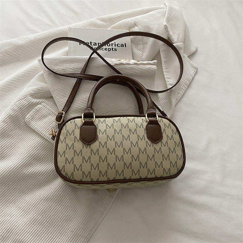 Stylische Monogram-Handtasche
