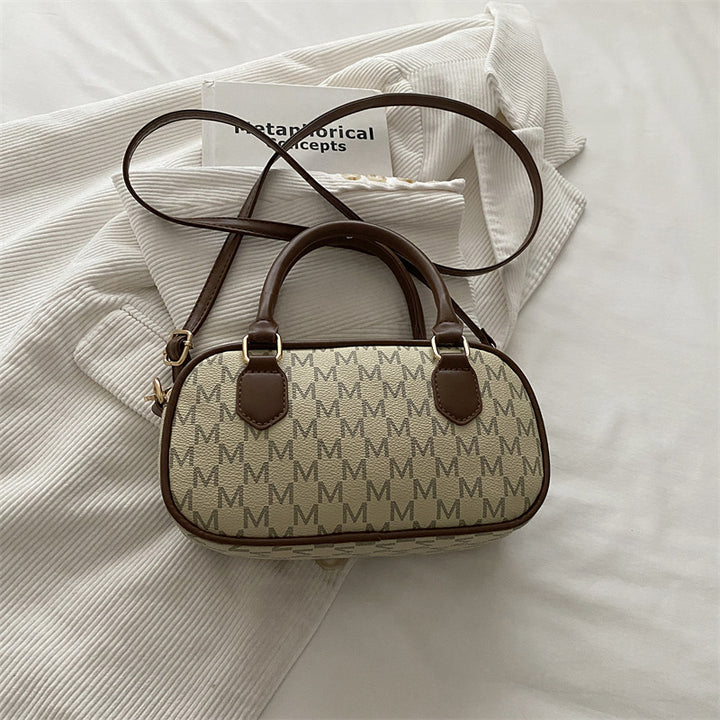 Stylische Monogram-Handtasche