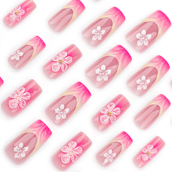 Kunstvolle Nagelverlängerungen mit floralen Designs Karnz