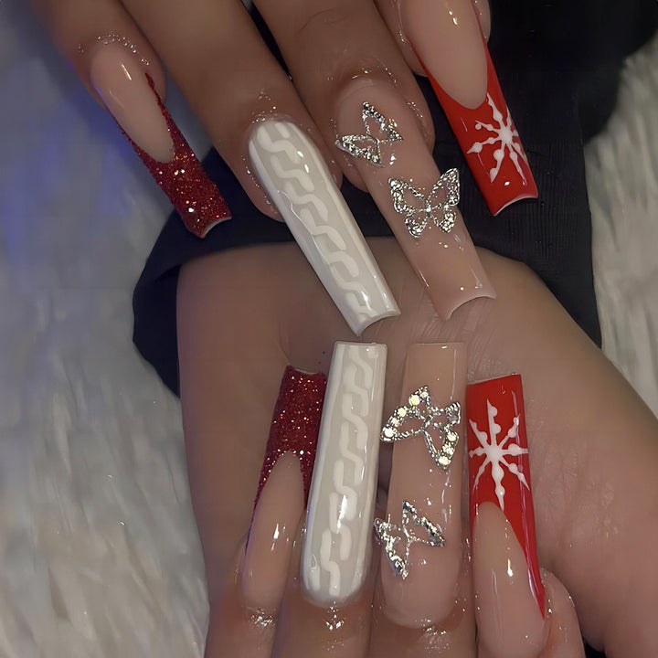 Festliches Press-On Nagelset mit Glitter und dekorativen Akzenten Karnz