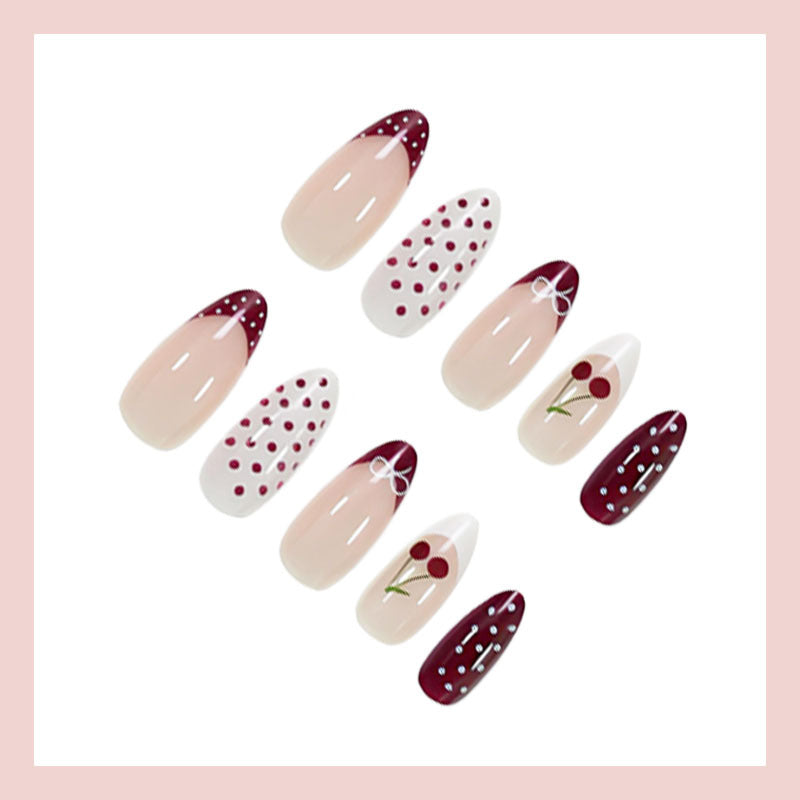 Kunstnagelset mit eleganten Kirsch- und Punkten-Mustern Karnz