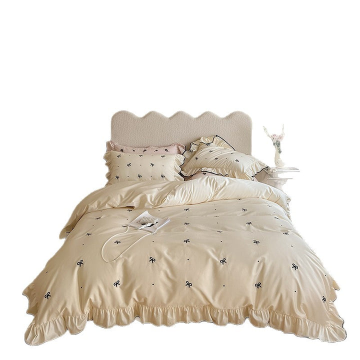 Bettwäsche-Set aus Baumwollsatin mit Rüschenvolant und zarter Schleifen-Stickerei