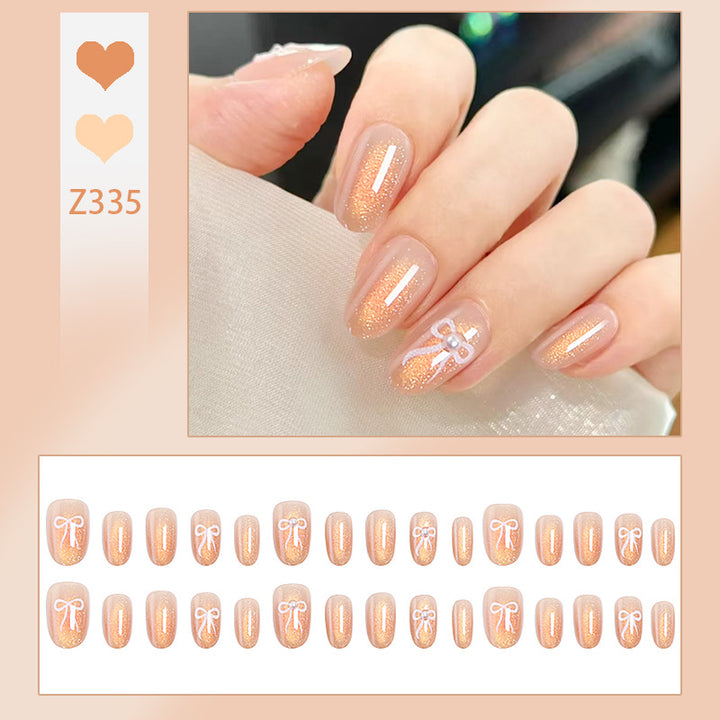 Glamouröse Kunstnagelspitzen mit Glitzerakzenten Karnz