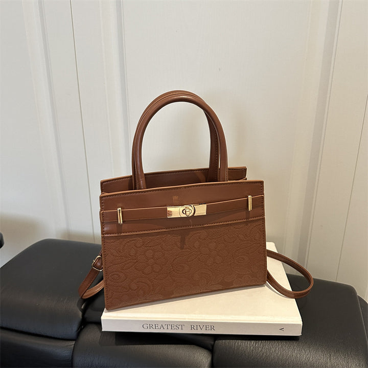 Elegante geprägte Handtasche