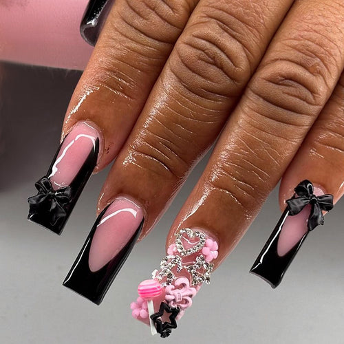 Kunstnagelset mit eleganten Akzenten und kreativem Design Karnz