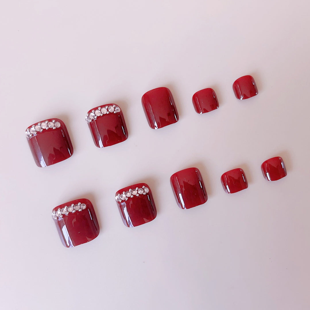 Kunstnagelset mit eleganter Nagelkunst und Funkelelementen Karnz