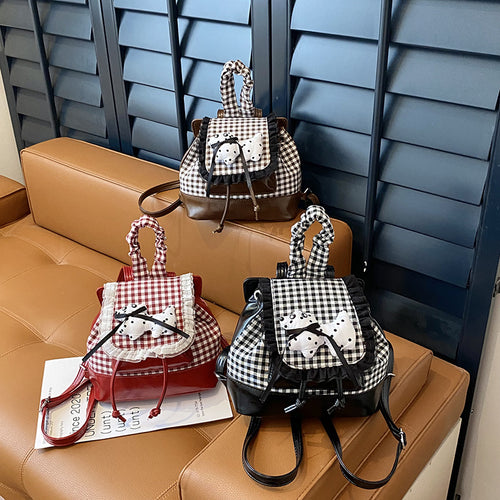 Verspielter Rucksack mit Karomuster und Tierapplikation Karnz