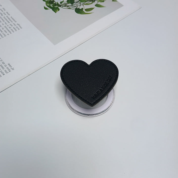 Herzförmiger Telefonhalter Karnz