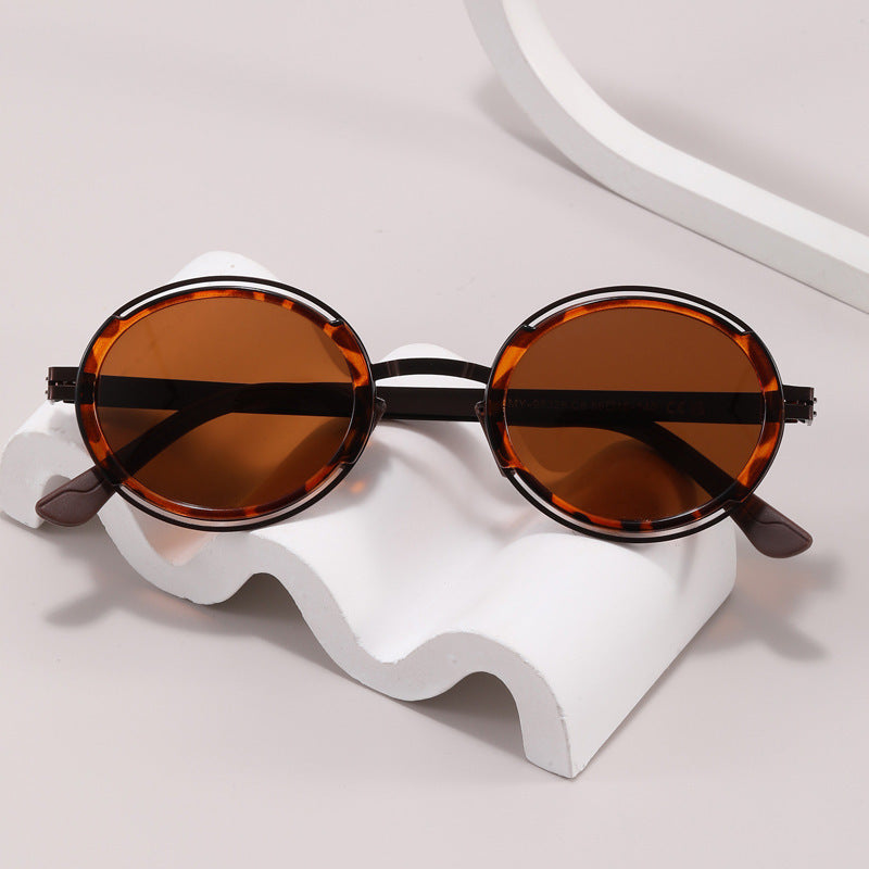 Damen modische runde Sonnenbrille mit elegantem Metallrahmen Karnz