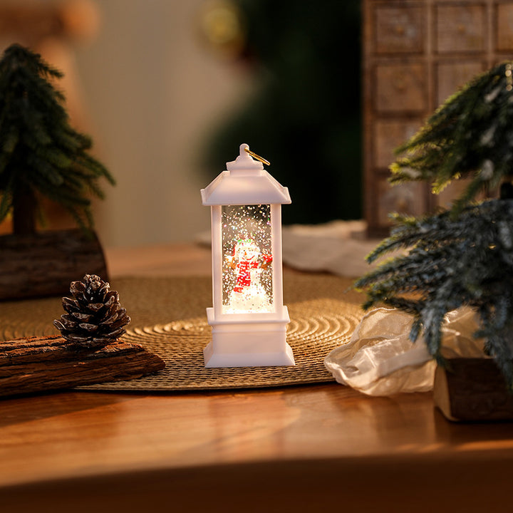 Beleuchtete Weihnachtslaterne mit glitzerndem Schneemann-Szenario Karnz