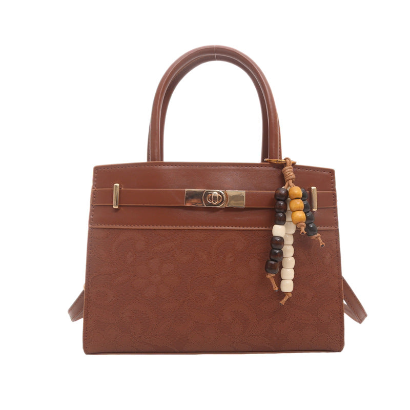 Elegante geprägte Handtasche