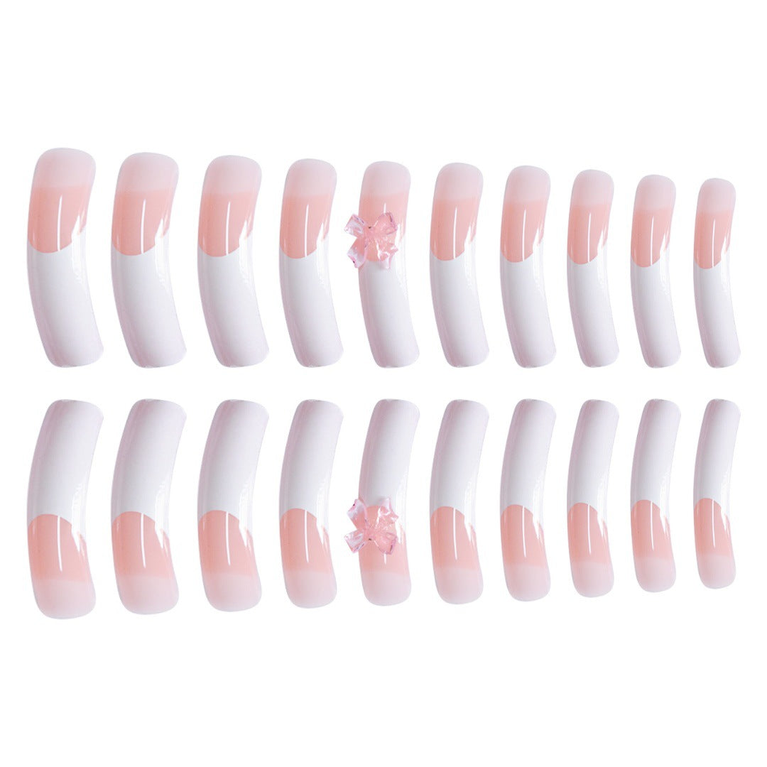 Stylische Acryl Press-On Nagelverlängerungen mit dekorativem Bogen Karnz
