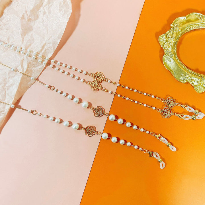 Glitzernde Brillenhalterkette mit Perlen und Floralen Anhängern Karnz