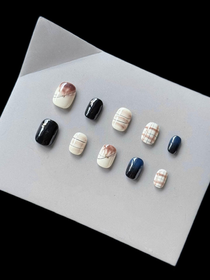 Künstlerisches Press-On Nagelset mit abstraktem Marmor Design