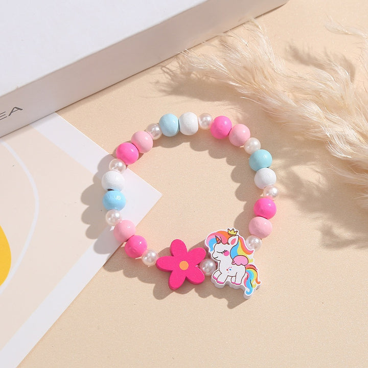 Verspieltes Kinderarmband mit Einhorn- und Blumenmotiv Karnz