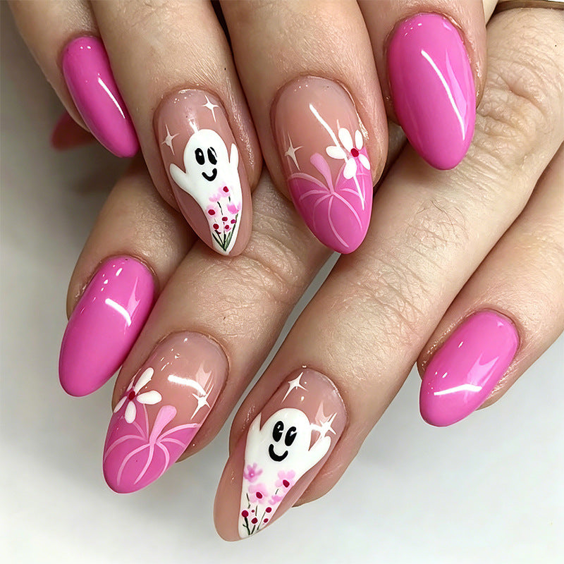 Kreative Nagelspitzen mit Geisterdesign und Blütenmotiven Karnz