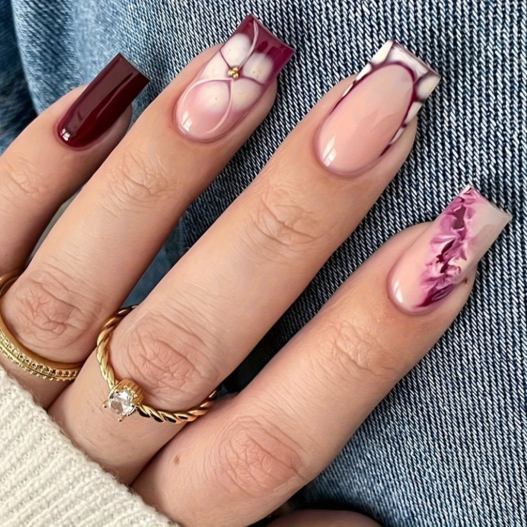 Künstlerische Gel-Nagelverlängerungen mit floralem Design Karnz