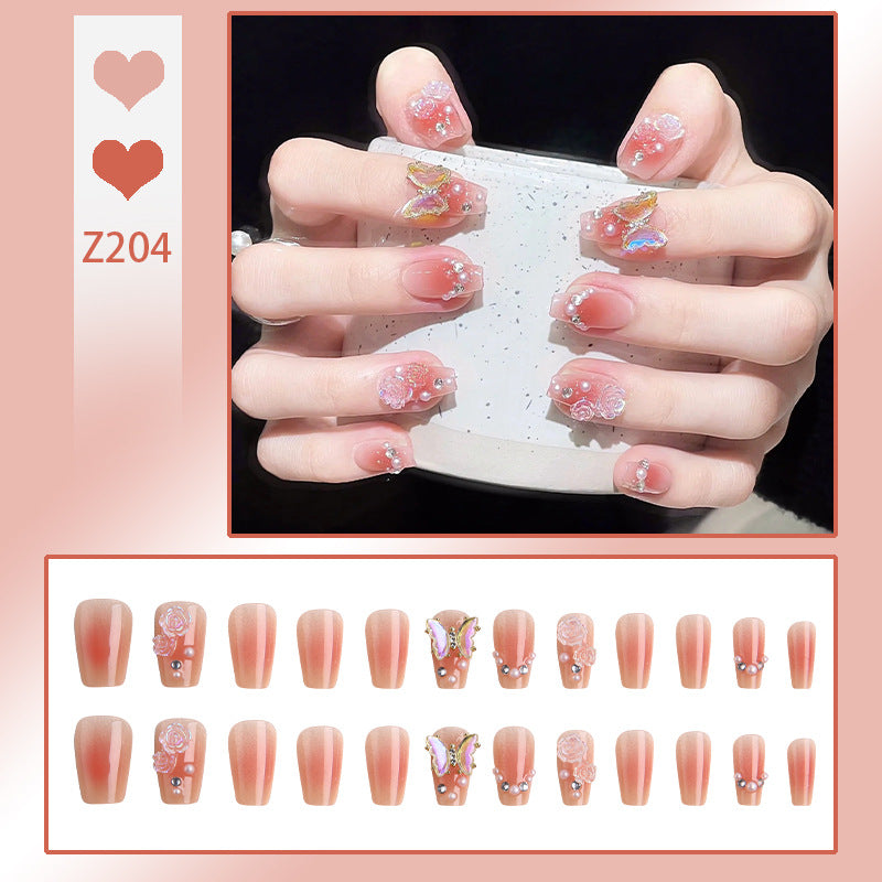 Kunstnagelset mit filigranen 3D-Blüten und strahlenden Glitzerakzenten Karnz