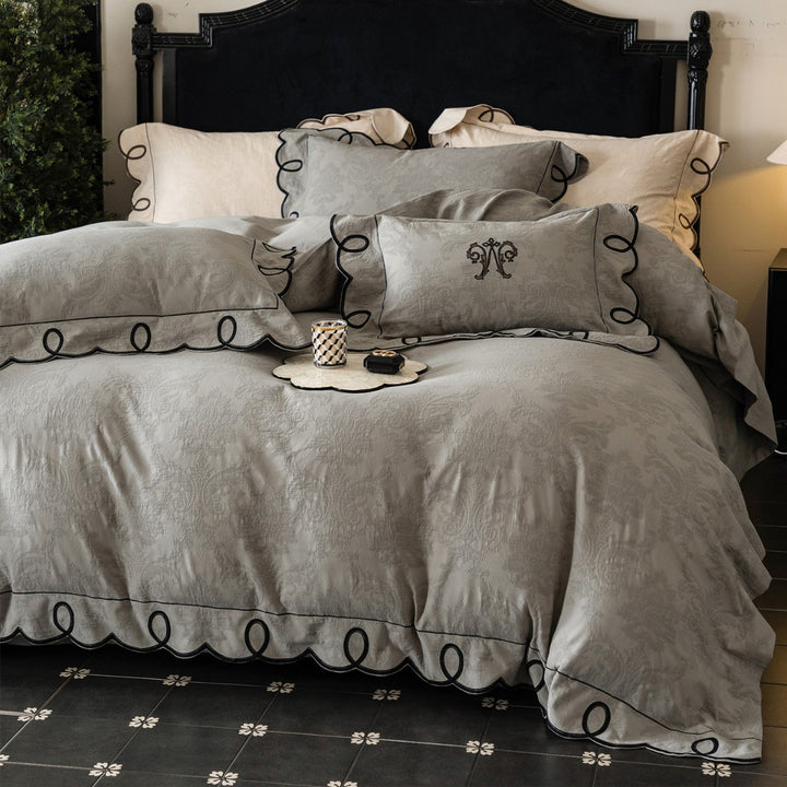 Besticktes Wellen-Loop Jacquard Bettbezug-Set mit passenden Kissenbezügen