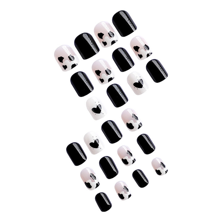 Kreative Nagelkunst mit Herz- und Tiermotiven Karnz