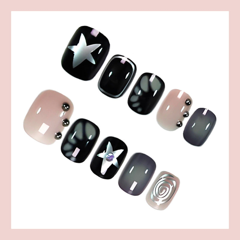 Kunstnagelset mit kreativen Sternen- und Glitzerdesigns Karnz