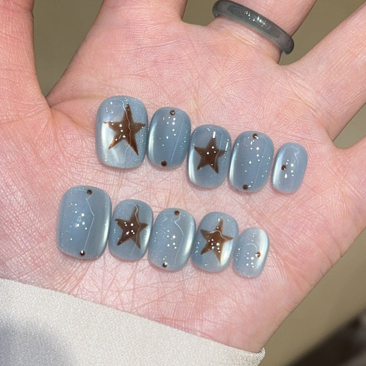 Künstliche Nagelspitzen mit Sterndesign Karnz