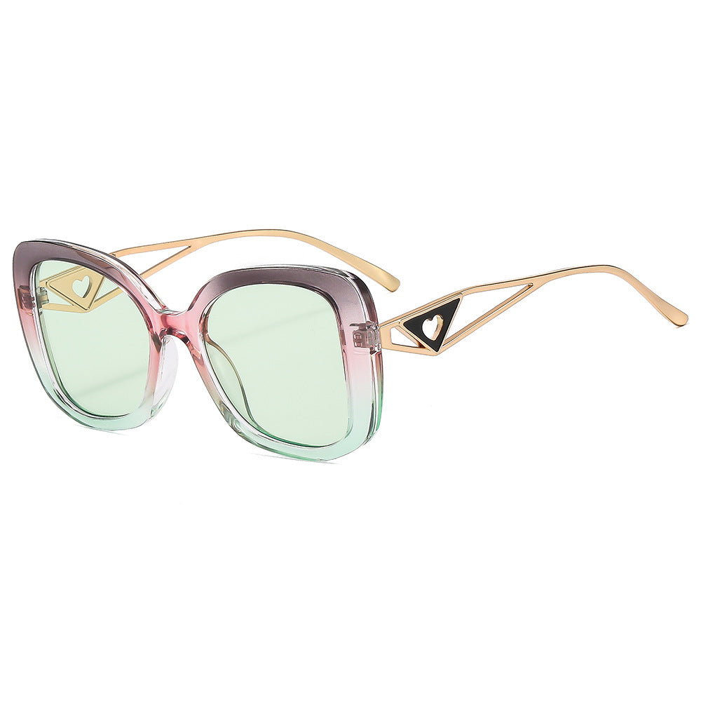 Damen modische oversized Sonnenbrille mit luxuriösem Herzdetail Karnz