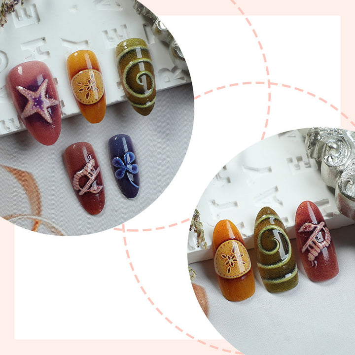 Kunstnagelset mit kreativen maritimen und naturinspirierten Motiven Karnz