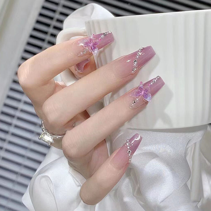 Kunstfingernägel mit Eleganten Flieder-Design Karnz