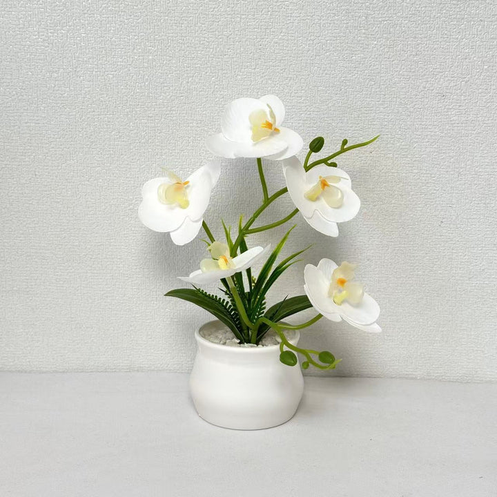 Elegante künstliche Orchideenpflanzenarrangement für die Wohnkultur