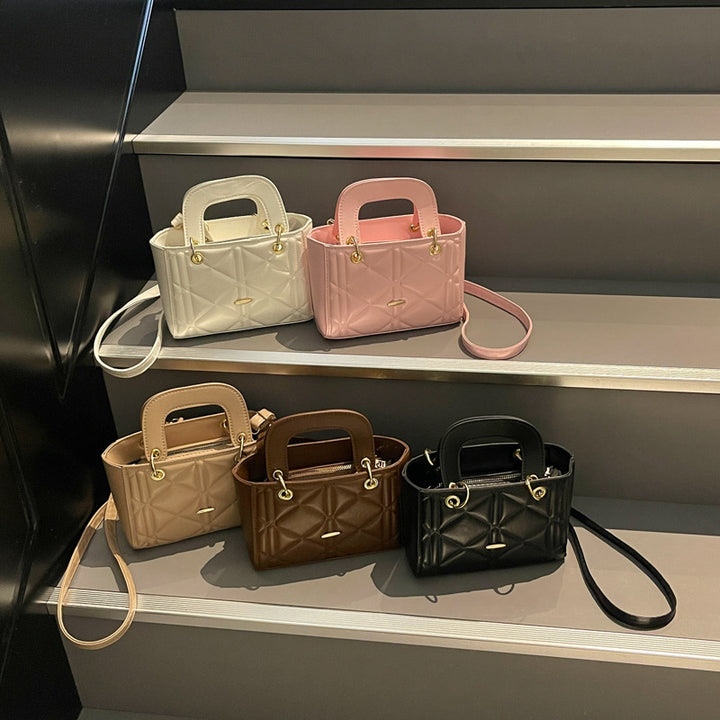 Gepolsterte Mini-Handtasche mit dualen Trageoptionen