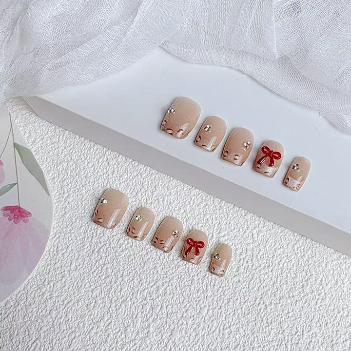 Elegante französische Tip Press-On Nägel Karnz