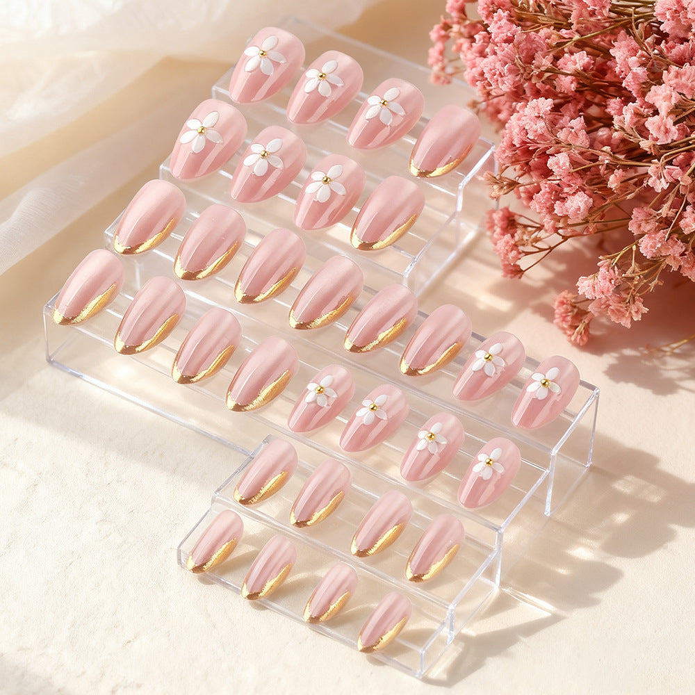 Blumenverzierte Gel-Nagelkunst Karnz