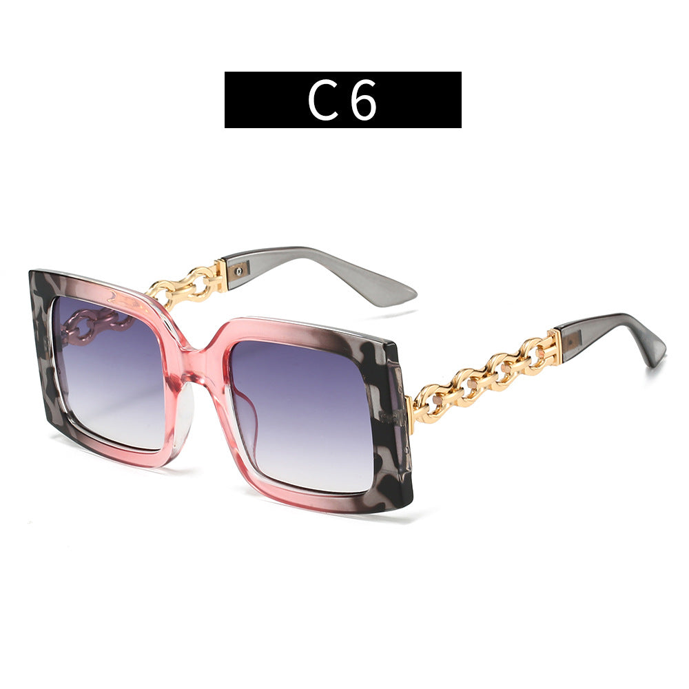 Damen elegante Sonnenbrille mit luxuriösen Kettendetails Karnz
