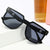Damen auffällige Sonnenbrille mit markantem geometrischem Rahmen Karnz