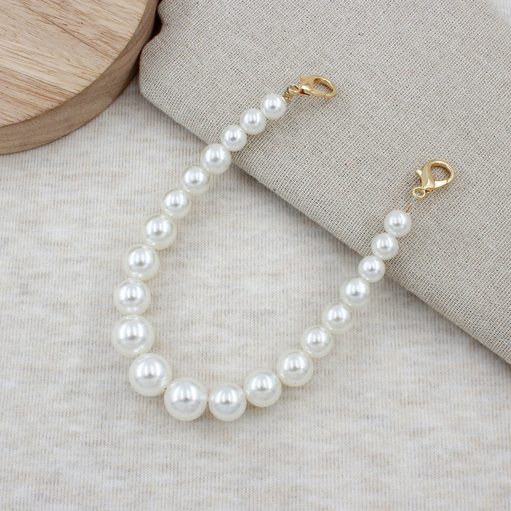 Elegantes Perlenaccessoire Karnz