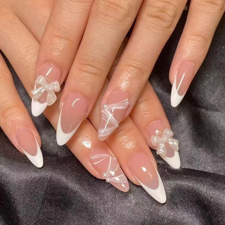 Kunstnagelset mit eleganten 3D-Schleifen und Spitzenverzierungen Karnz